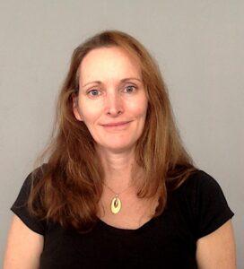 Relaxed woman receiving mental wellness therapy at Mind & Body Works.