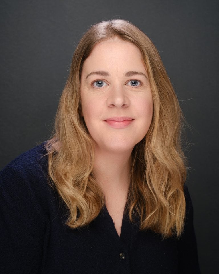 Calm woman smiling, therapy, wellness, mental health, relaxing, self-care, professional support, Mind & Body Works.