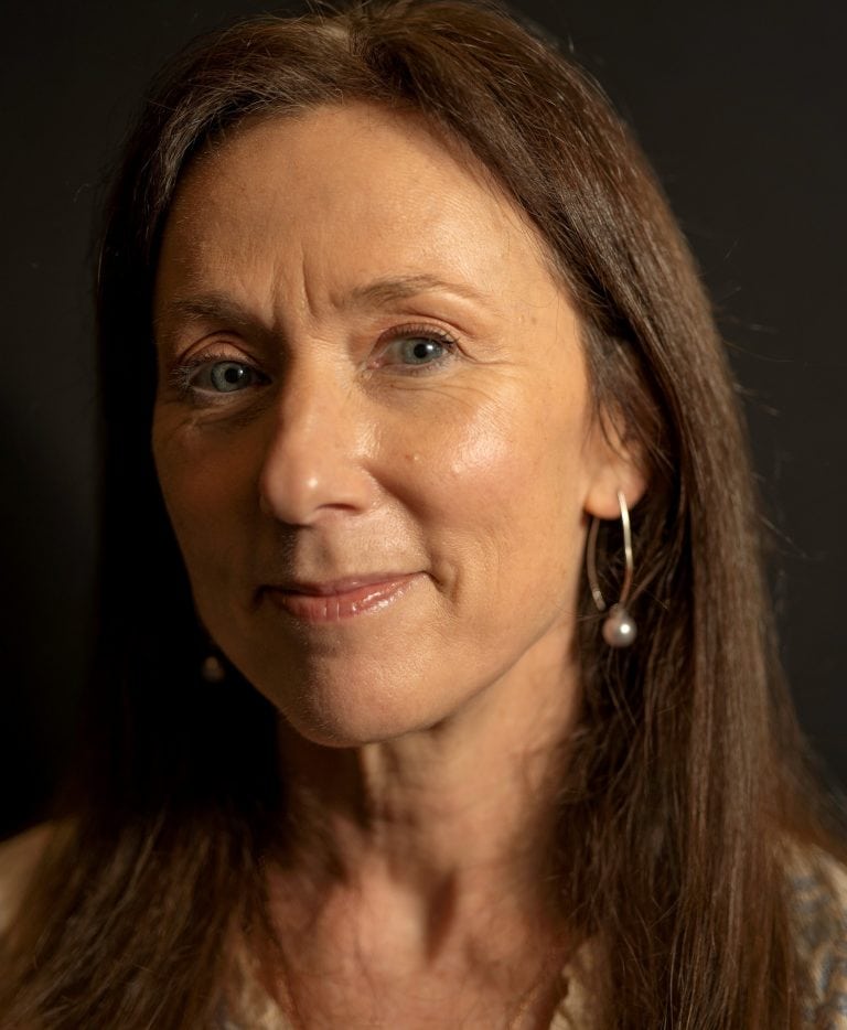 Therapist providing holistic health and wellness services.