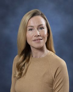 Therapist portrait at Mind & Body Works, professional wellness provider.